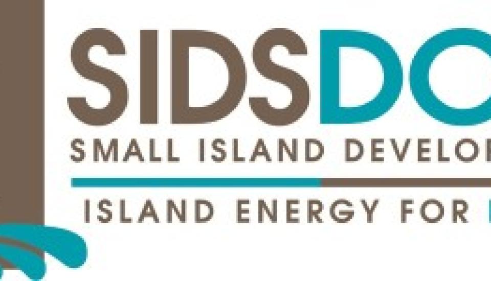 Image of SIDS DOCK and IRENA signed MoU that will support CCREEE and PCREEE